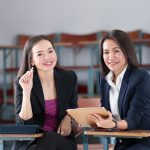 Master's degree female student sitting in the classroom at university