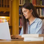 Woman studying in the library