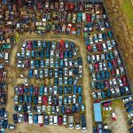 Top photo of junkyard