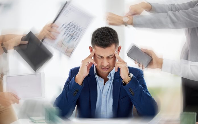 Businessman experiencing stress and anxiety