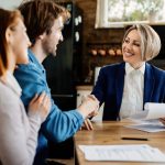 Lender talking with customers