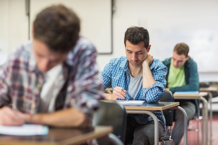 Male student having an exam