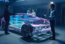 Engineers Working on Augmented Reality 3D Model Electric Car