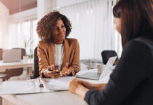 Young woman doing a job interview in the office