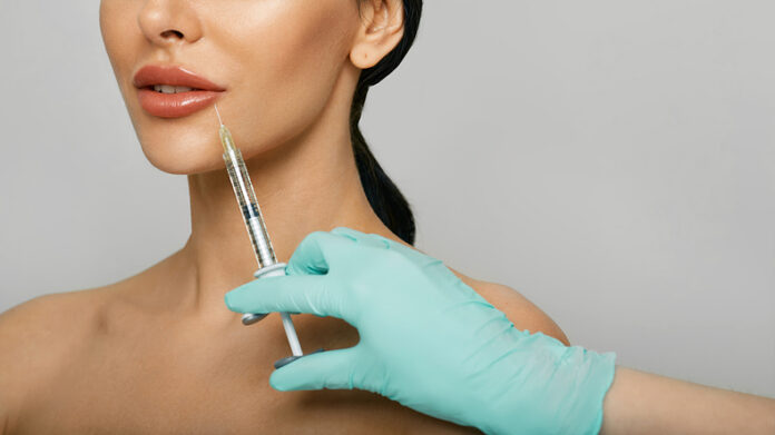 Lips filler injection for beautiful woman's lip