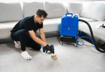 Cleaning the carpet at home using drill and brush