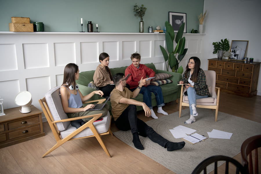 Colleagues talking and learning during study session