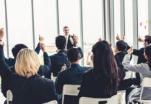 Group of business people meeting in a seminar conference