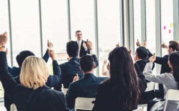 Group of business people meeting in a seminar conference