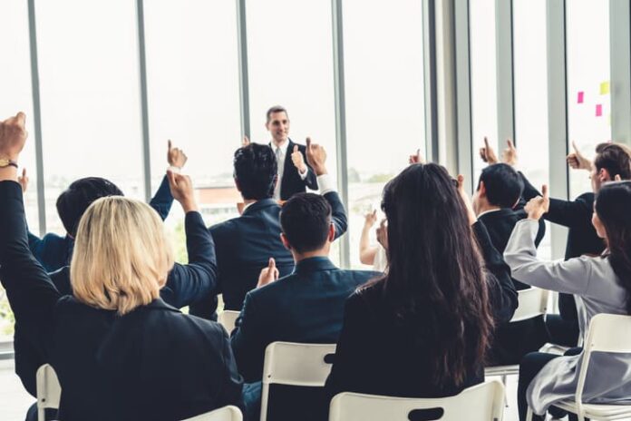 Group of business people meeting in a seminar conference