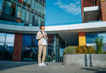 Student standing outside the building