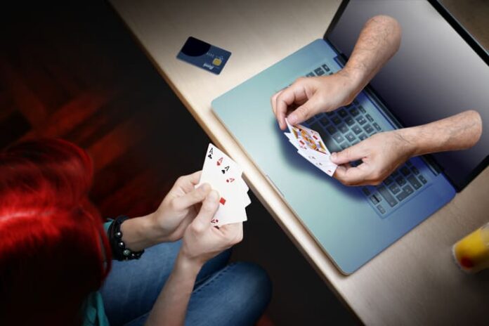 woman playing online casino poker game