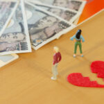 Money image of divorced or breaking-up couple