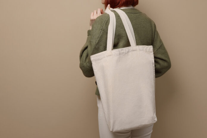 woman with tote bag