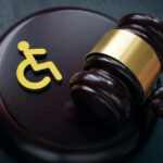 Disabled person sign and gavel.