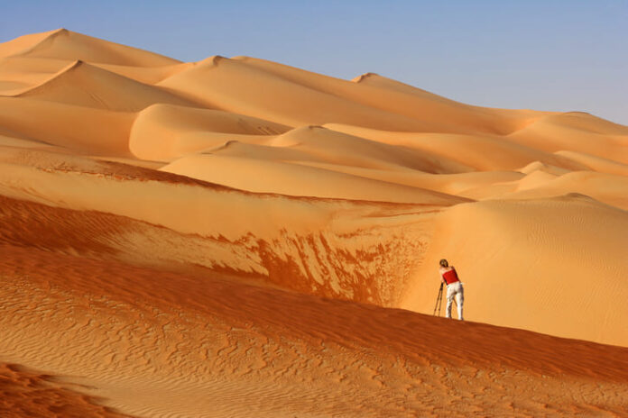 Photographing abstract patterns in the dunes of the Rub al Khali or Empty Quarter