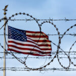 American flag and barbed wire, USA border