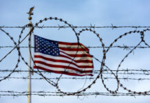 American flag and barbed wire, USA border