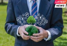 Businessman holding a globe with icon carbon credit reducing to a sustainable climate solution