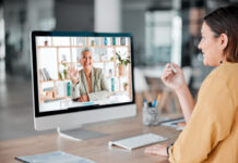 Video call, computer and business women wave in offic