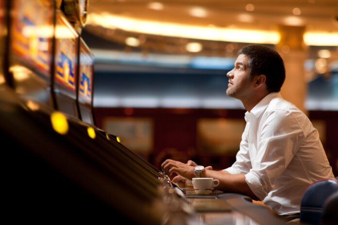 Casino slot machine player