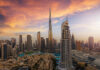 Panoramic sunrise view of the downtown district skyline of Dubai