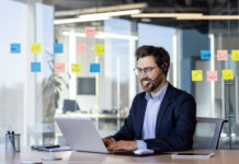 Business professional wearing headset