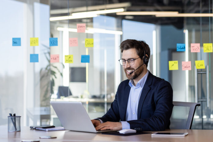 Business professional wearing headset