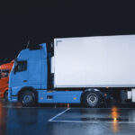 Line of Semi-Trucks with Cargo Trailer Drives Standing on the Overnight Parking Place