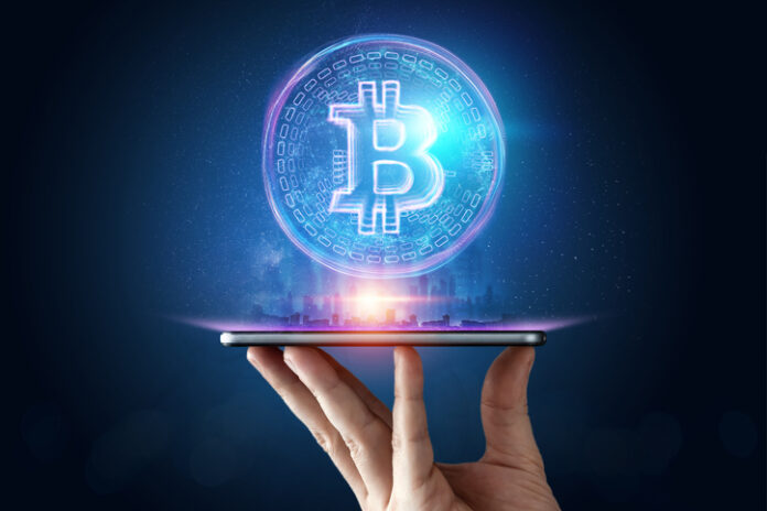 Male hand, bitcoin hologram, ultraviolet creative background