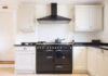 Modern modular kitchen interior, range cooker and chimney hood