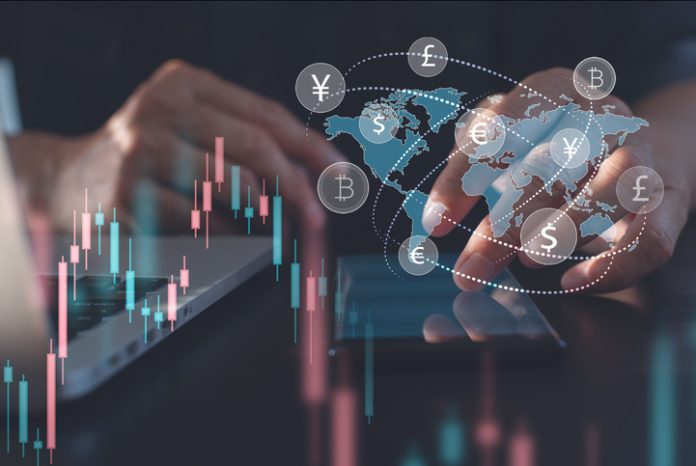 Trader using mobile phone with trading graph, currency exchange and global currencies on virtual screen