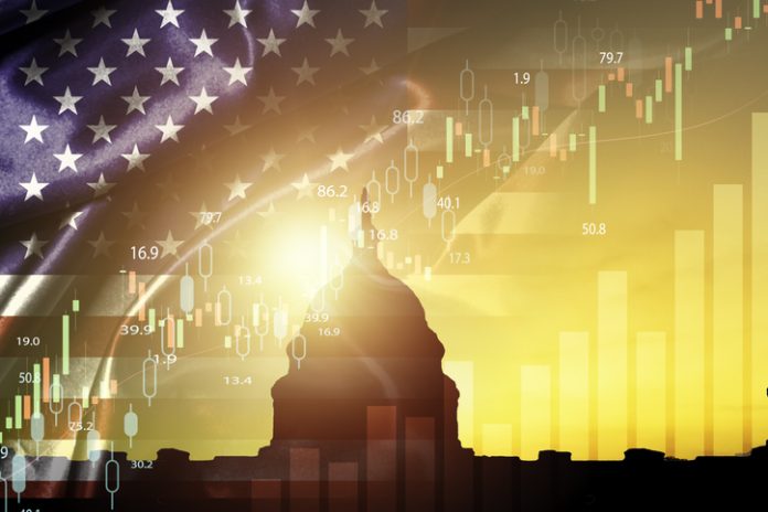 Silhouette of White House with united state of America flag and stock market chart for USA election president related with economy and investment