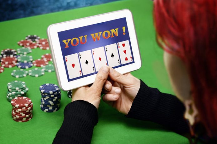 Woman playing poker in online casino