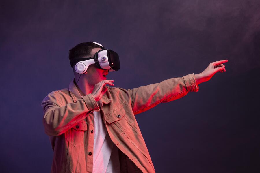 Man wearing vr goggles for video game 