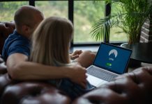 Couple using laptop with VPN on screen