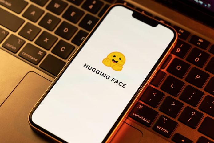 Hugging face logo on phone screen