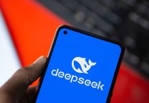 Deepseek Ai logo is displayed on smartphone.