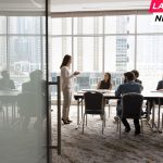 team talking at meeting table