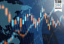 Stock market prices charts on tall buildings background.