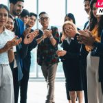 Diverse business people clapping and applause at new manager