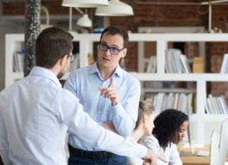 Colleagues arguing in the workplace