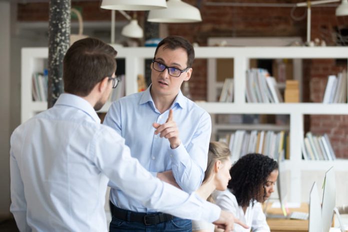 Colleagues arguing in the workplace