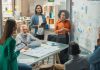 Multiethnic Business Team Discussing Strategy in a Meeting Room at the Office