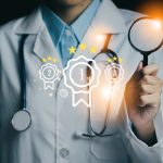 Medical professional holding a magnifying glass device , symbolizing quality and excellence in healthcare.