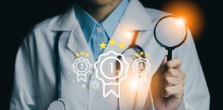 Medical professional holding a magnifying glass device , symbolizing quality and excellence in healthcare.