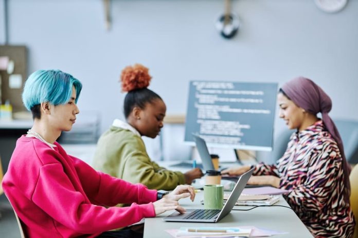Young generation using computer in office