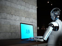 AI robot working on computer. Agentic AI concept