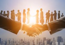 business network, shaking hands with client