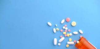 Close up of many colorful pills and medicine.